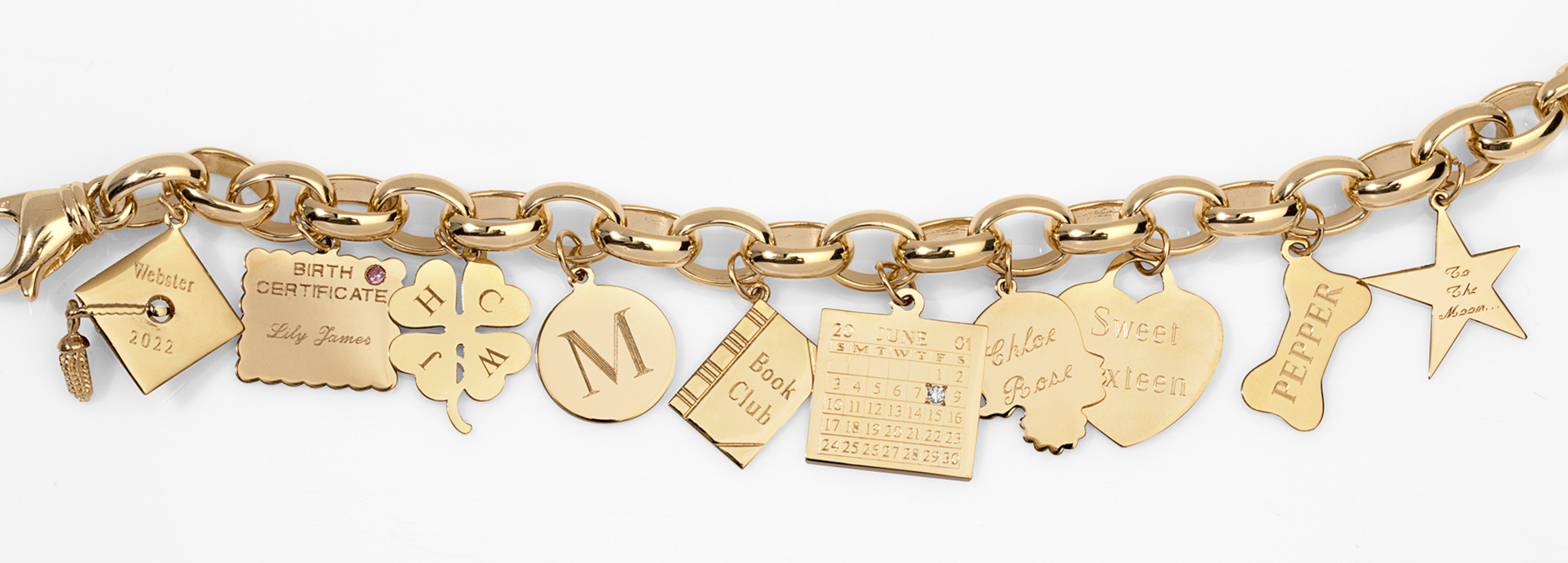 close up of engraved charms